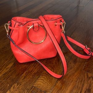 No brand. Red, crossbody bag.